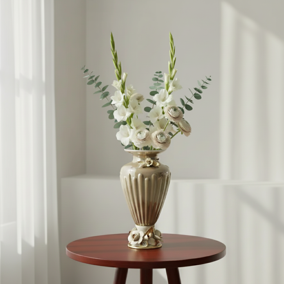 Elegant home décor pieces including porcelain planters and decorative accents by Fleur de Lis