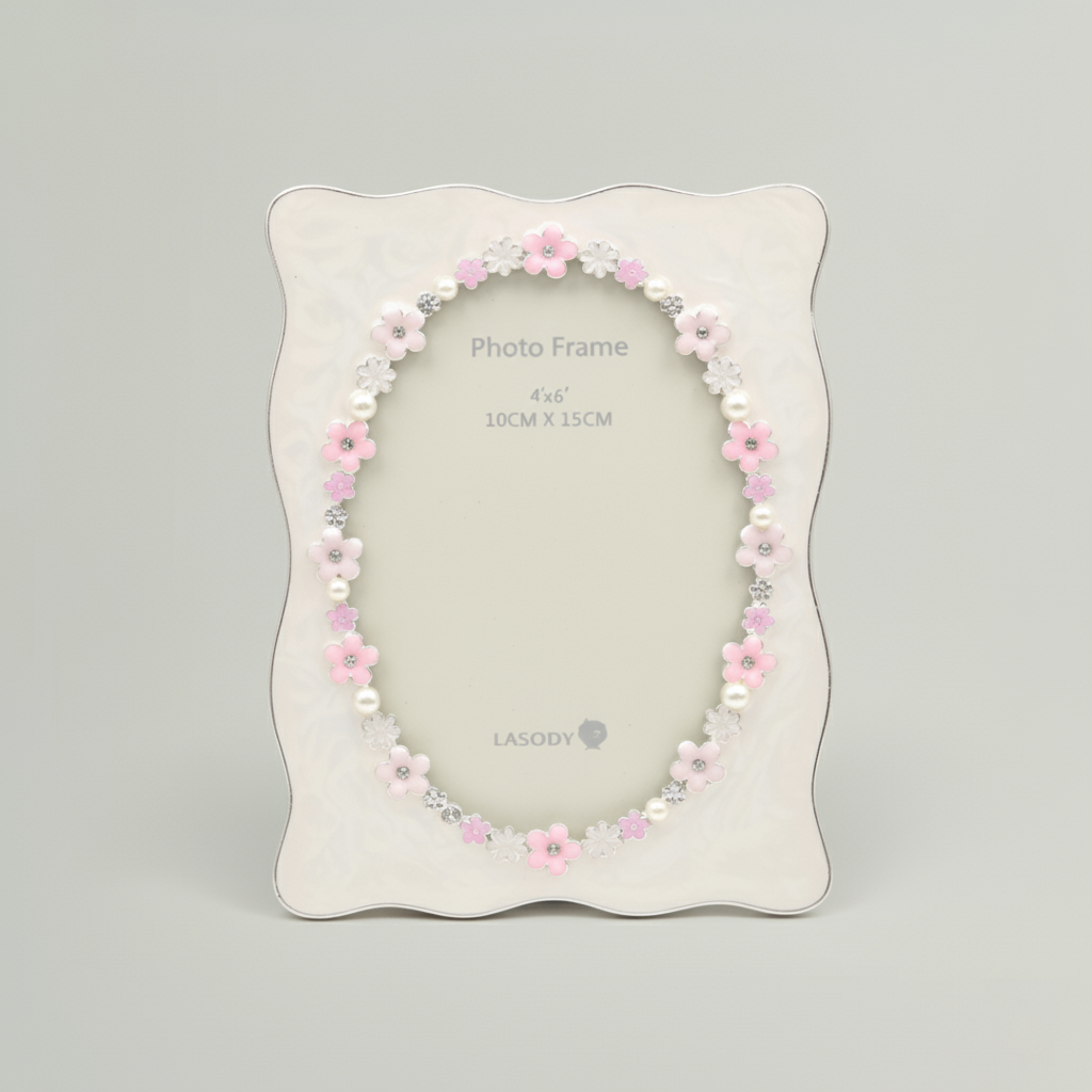 Decorative photo frame with floral design on a gray background