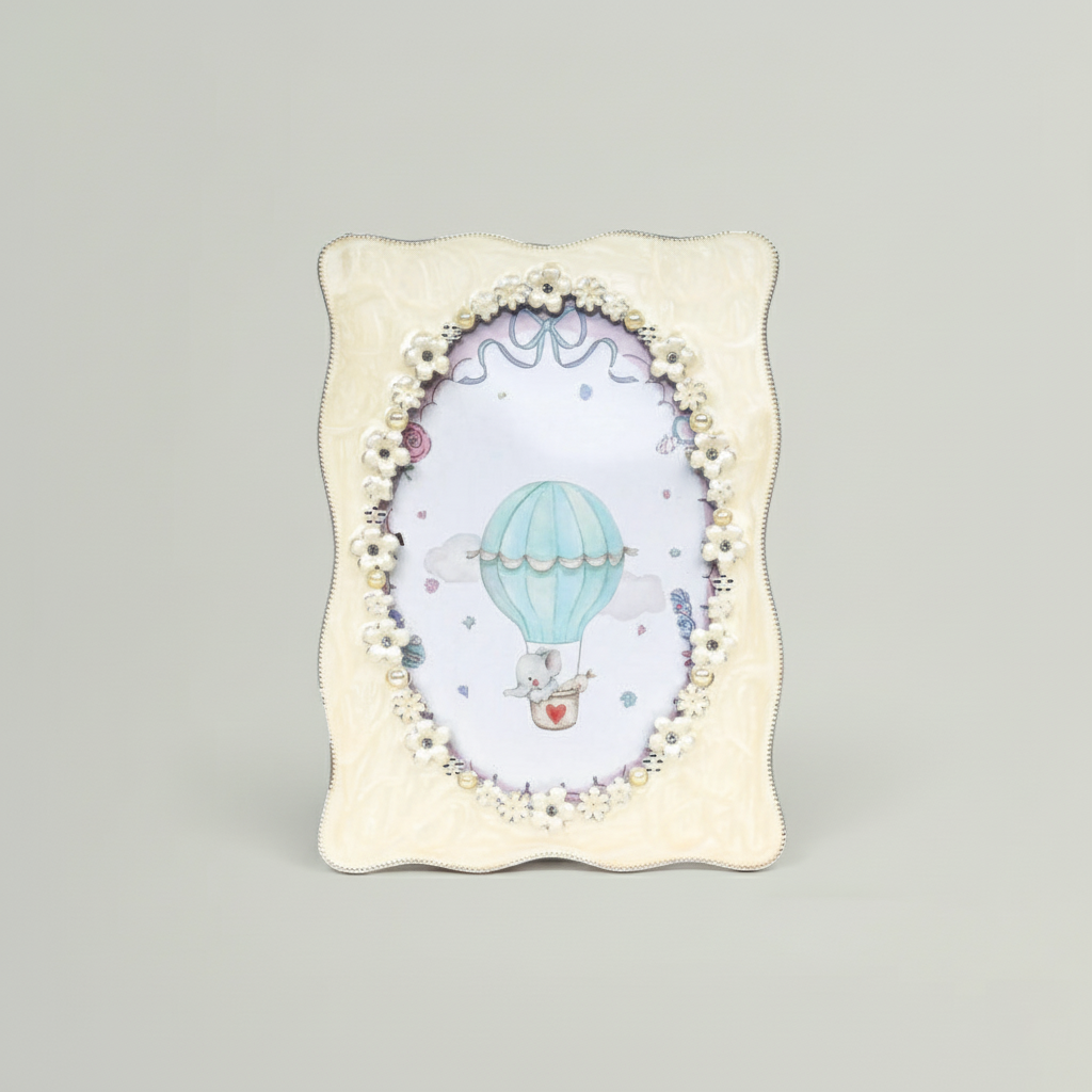 Decorative photo frame with a hot air balloon design on a gray background