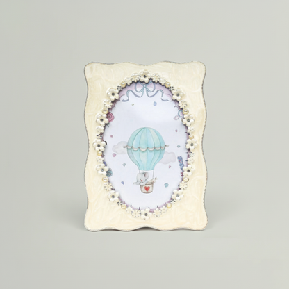 Decorative photo frame with a hot air balloon design on a gray background