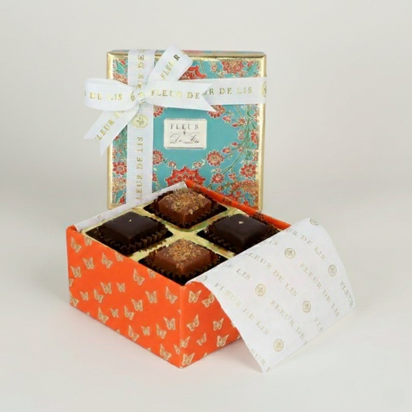 Surprise Box – 4 Assorted Ganache Chocolates Fleur de Lis