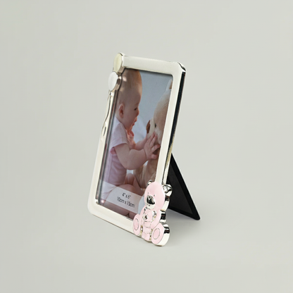 Photo frame with a teddy bear design on a gray background